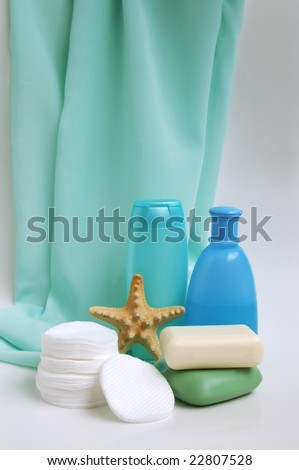 Household items for cleanliness on a satin background