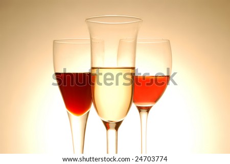 Various wine glasses on yellow background