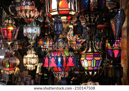 Background from traditional moroccan glass and metal lamps in shop in the medina of Marrakech, Morocco