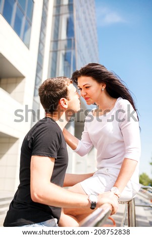 Couple kissing happiness fun. Interracial young couple embracing laughing on date. Caucasian man, Asian woman on Manhattan, New York City, USA.