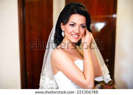 Portrait of a beautiful smiling bride. Young beautiful bride