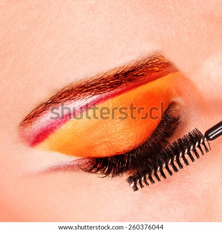 Woman eye with long eyelashes. Eyelash extension.Beautiful young woman eyelash extension