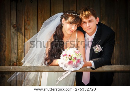 Close up portrait of happy bride and groom
