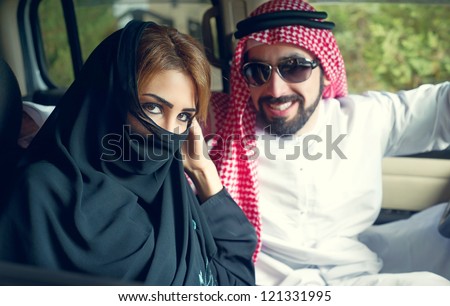Edit Arabian Couple in the car near home Edit Arabian Couple in the car near home