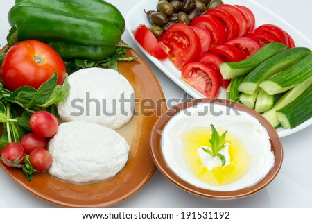 Lebanese food of Labneh Yogurt cheese and goat cheese with veggies