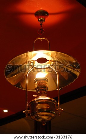 Decorative lamp. Twilight. Reflections, light and color.