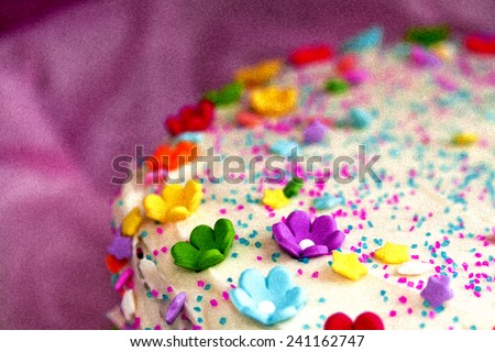 Birthday cake with colorful flowers and stars with oil painting effect.  Let\'s eat!