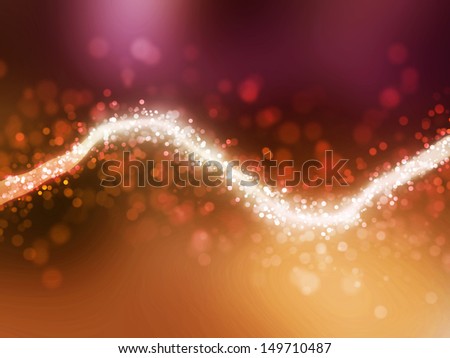 Blurred orange sparkles and glowing central line. Boken effect. Beautiful forms.