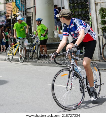 Bangkok - September 21: unidentified men participated to cyclist took part in the activity Car Free Day campaign at Silom Road on September 21, 2014 in Bangkok, Thailand.