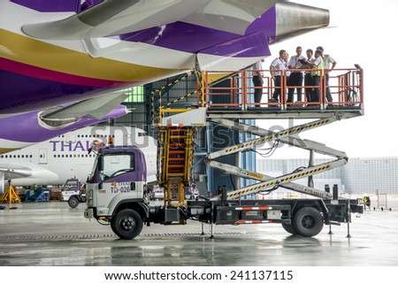 Bangkok Thailand - July 23, 2014: Aircraft Engineer during maintenance boeing 787 Dreamliner in Thai Airways at Suvarnabhumi Airport