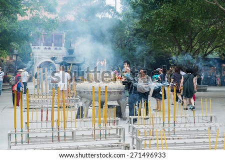 Hong Kong, China - October 26: People are beg from the God in temple October 25, 2014 in Hong Kong, China. People are believe in God.