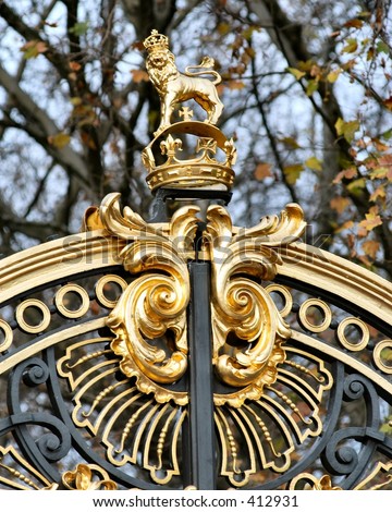 Royal Crest on a gate at Buckingham Palace in London England