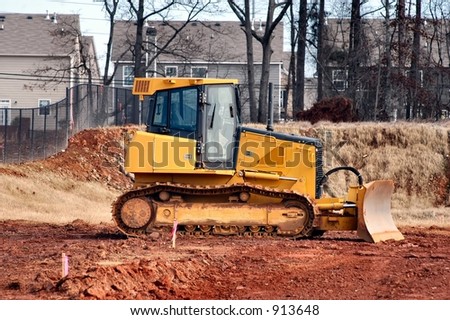 Profile view of a Bulldozer at a work site