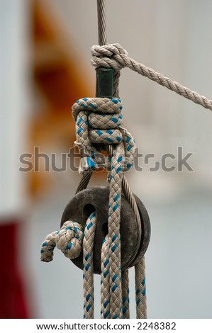 Wooden block and Tackle smartly tied off