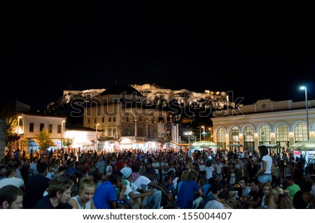 ATHENS-AUGUST 4: Monastiraki Square at the night on August 4, 2013 in Athens, Greece. Monastiraki is a flea market neighborhood and is one of the principal shopping districts in Athens, Greece.