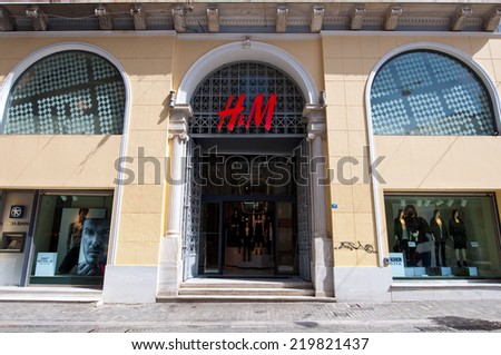ATHENS-AUGUST 22: H&M store building on Emrou street on August 22,2014 Athens, Greece. H & M is a Swedish retail-clothing company, known for its fast-fashion clothing for men, women, and children.
