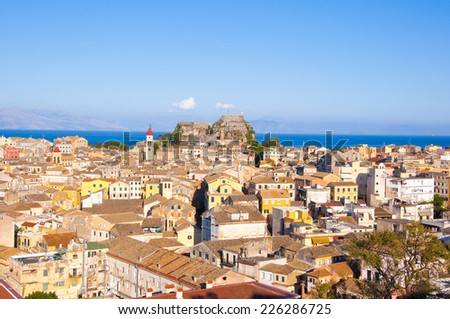 CORFU-AUGUST 22: Panoramic view of Corfu old town with the Old Fortress and the Saint Spyridon Church in the distance from the New Fortress on August 22, 2014 on Corfu island, Greece.