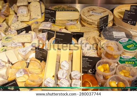 AMSRETDAM-APRIL 28: Different kind of Dutch cheese displayed for sale in a local shop on April 28,2015, the Netherlands.The Netherlands produces a variety of the hard or semi-hard tempting cheeses.