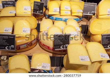AMSRETDAM-APRIL 28: Various Dutch cheese displayed for sale in a local shop on April 28,2015, the Netherlands.The Netherlands produces a variety of the hard or semi-hard tempting cheeses.