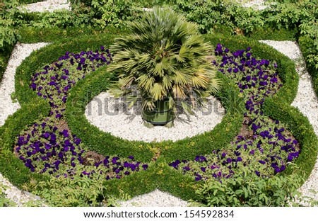 The photograph of a garden flower bed via birds eye view/Garden bed