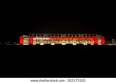 MAINZ, GERMANY - MARCH 9: The facade of the Co Face Arena from the soccer Club 1. FC Mainz at night after a game on March 09, 2014 in Mainz / Co face Arena at night