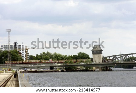 BERLIN, GERMANY - JUNE 16: The Berlin city high-speed railway and road traffic crossing the Else bridge on June 16, 2014 in Berlin / Bridge in Berlin