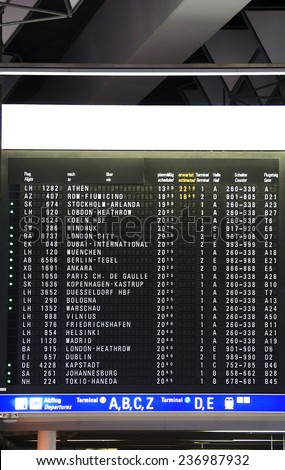The digital display with departure times in an airport / Digital display departure times