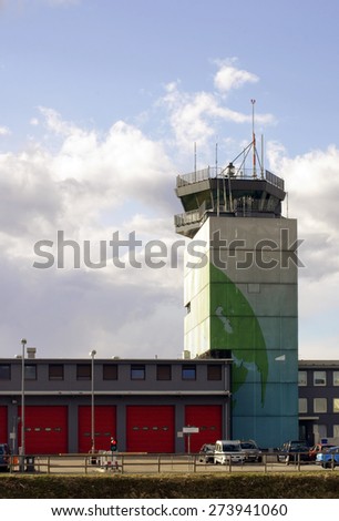 HAHN, GERMANY - MARCH 31: The Airport tower of the Airport Frankfurt-Hahn with a fire station in the building on March 31, 2015 in Hahn / Airport Tower Airport Frankfurt-Hahn
