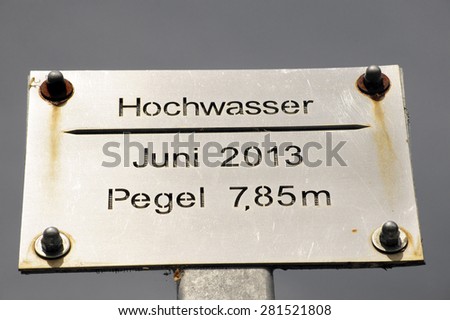 A new high water mark from the river Elbe in the year 2013 on a metal sheet / High-water mark Elbe 2013