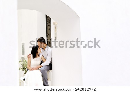 romantic couple tenderly together in wedding day, Sperlonga, Italy