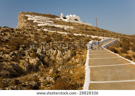 Long uphill path to a greek orthodox church. Folegandros island, Greece