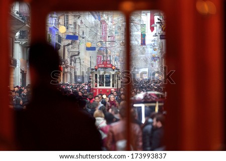 Istanbul, Turkey - January 12: People Walking On Istiklal Street January 12, 2014 In Istanbul Turkey. It Is The Most Famous Street In Istanbul Visited By Nearly 3 Million People A Single Weekends Day
