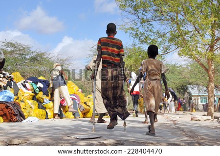 DADAAB, SOMALIA-AUGUST 07: Dadaab refugee camp to get help from crutches young Dadaab, Somalia on August 7, 2011. Thousands of Somali immigrant camp\'s people.