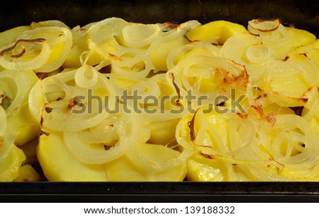 baked potato slices with onion