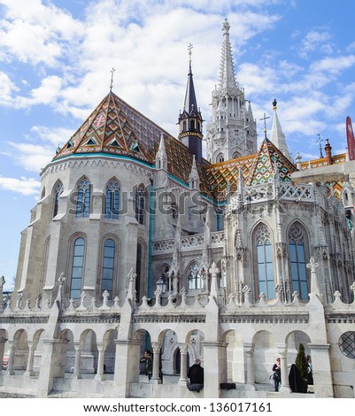 Matthias Church, a church located in Budapest, Hungary, in front of the Fisherman\'s Bastion at the heart of Buda\'s Castle District.