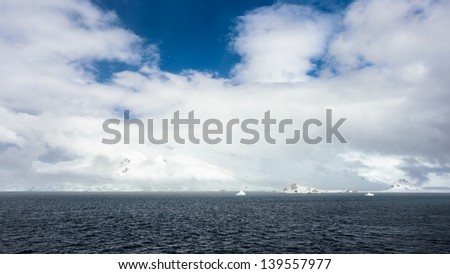 Atlantic Ocean under the clouds of the blue sky