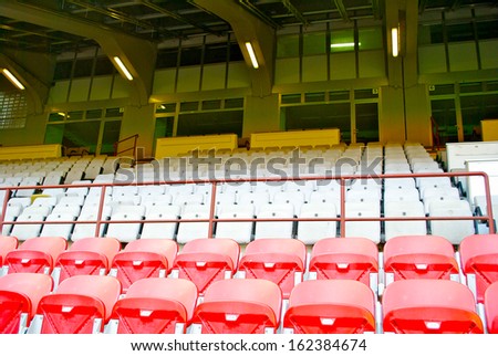 MILAN, ITALY - SEPTEMBER 9, 2012: Seats on the Stadio Giuseppe Meazza (San Siro),is a football stadium in Milan, Italy, on September 9th, 2012. It\'s home for A.C. Milan and F.C. Internazionale Milano.