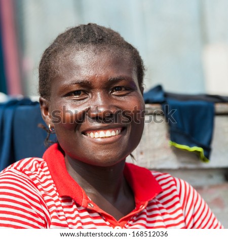Ghana - March 2, 2012: Portrait Of A Smiling Ghanaian Woman In Ghana, On March 2nd, 2012. People In Ghana Suffer From Poverty Due To The Slow Development Of The Country
