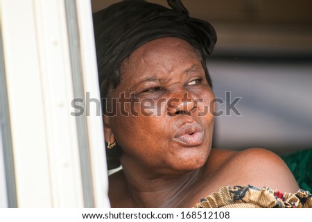 GHANA - MARCH 2, 2012: Unidentified Ghanaian woman  in Ghana, on March 2nd, 2012. People in Ghana suffer from poverty due to the slow development of the country
