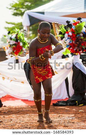 GHANA - MARCH 3, 2012: Unidentified Ghanaian girl dances traditional African dance in Ghana, on March 3rd, 2012. Music is the main kind of entertainment in Africa