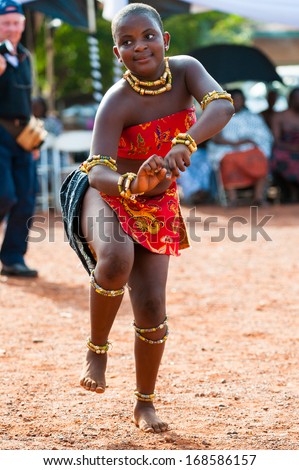 GHANA - MARCH 3, 2012: Unidentified Ghanaian woman dances traditional African dance in Ghana, on March 3rd, 2012. Music is the main kind of entertainment in Africa
