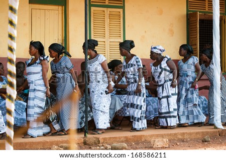 GHANA - MARCH 3, 2012: Ghanaian people in parade clothes come to see local concert of the national African music in Ghana, on March 3rd, 2012. Music is the main kind of entertainment in Africa