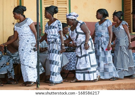 GHANA - MARCH 3, 2012: Ghanaian people in parade clothes come to see local concert of the national African music in Ghana, on March 3rd, 2012. Music is the main kind of entertainment in Africa
