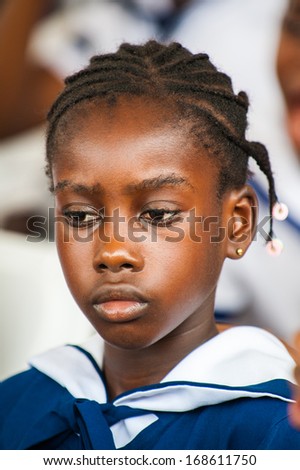 ACCRA, GHANA - MARCH 4, 2013: Unidentified student from one of the Ghanaian schools wearing special uniform in Ghana, Mar 4, 2013. This uniform is one of the ways of humanitarian help to Ghana