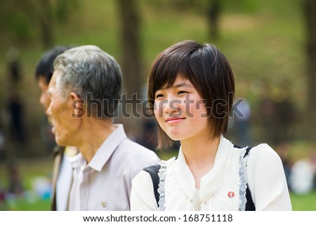 NORTH KOREA - MAY 1, 2012: Korean people watch the public games due to the celebration of the Internationa Worker's Day in N.Korea, May 1, 2012. May 1 is a national holiday in 80 countries
