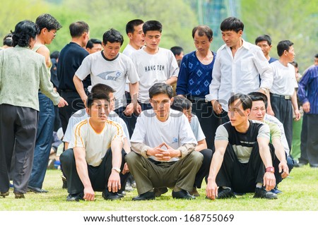 NORTH KOREA - MAY 1, 2012: Korean people prepare for the tug of war game during the celebration of the International Worker's Day in N.Korea, May 1, 2012. May 1 is a national holiday in 80 countries