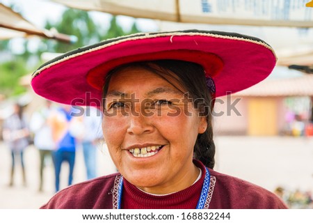 PERU - NOVEMBER 6, 2010: Unidentified Peruvian woman in traditional hat work at the local market in Peru, Nov 6, 2010. Over 50 per cent of people in Peru live below the the poverty line.