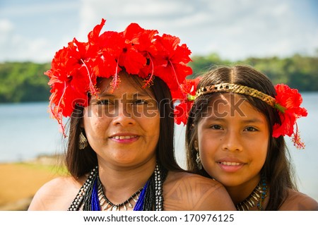 Embera Village, Panama, January 9, 2012: Portrait Of An Unidentified Native Indian Woman And Her Daughter In Panama, Jan 9, 2012. Indian Reservation Is The Way To Conserve Native Culture, Languange