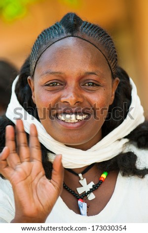AKSUM, ETHIOPIA - SEP 24, 2011: Unidentified Ethiopian beautiful girl wearing white tissue in Ethiopia, Sep.24, 2011. Children in Ethiopia suffer of poverty due to the unstable situation