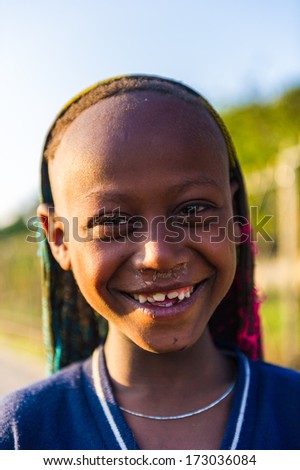 AKSUM, ETHIOPIA - SEP 30, 2011: Portrait of an unidentified Ethiopian cute little boy in Ethiopia, Sep.30, 2011. Children in Ethiopia suffer of poverty due to the unstable situation
